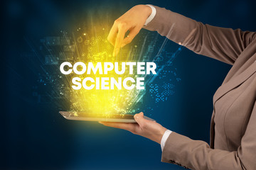 Close-up of a touchscreen with COMPUTER SCIENCE inscription, innovative technology concept