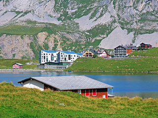 Summer and winter sports and recreational resort Melchsee-Frutt on the shores of Lake Melchsee,...
