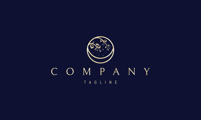 Fototapeta premium Vector golden logo in which an abstract image of a rose bush bending over the moon.