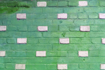 Background texture of a old green brick wall