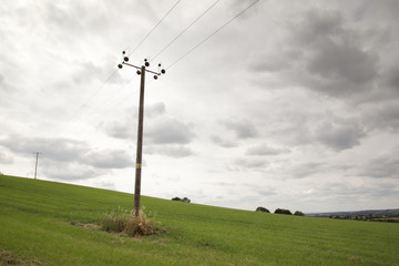 Fototapeta na wymiar power lines cuting into the landscape