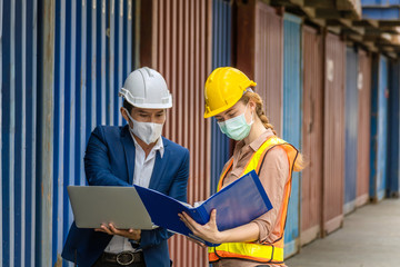 industrial worker caucasian woman and asian engineer control worker checking cargo container at container cargo harbor, transport, industrial, logistic, transportation, import and export concept