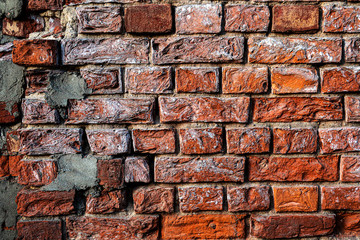 background image old textured brick wall with potholes and cement patches