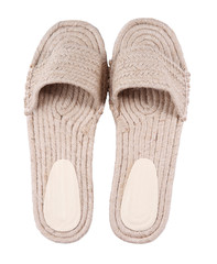 Stylish knitted shoes isolated on white, top view. Beach accessory