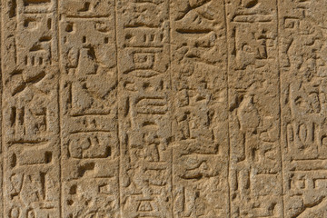 Egyptian ancient hieroglyphs on the stone wall
