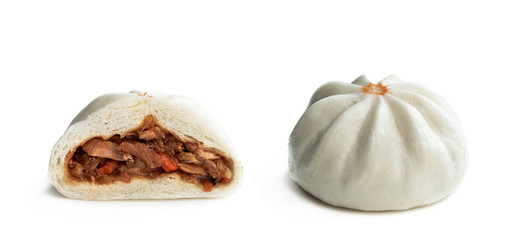 Steamed bao buns with delicious filling isolated on white