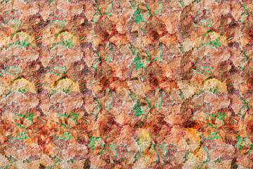 Scraps of wood and colored sheets create an artistic textured background.