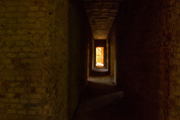 Fototapeta na wymiar Light at the end of the corridor in the Eliseev estate in Leningrad region