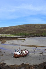 boat on the beach, south uist, outer hebrides