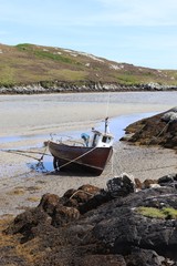fishing boat on the beach, south uist, outer hebrides, scotland