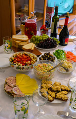 served dining table, food and drinks