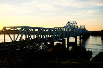 sunset over the bridge in Vicksburg over the mighty Mississippi River.