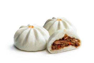 Steamed bao buns with delicious filling isolated on white