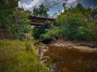 Fototapeta premium Bridge over stream 
