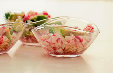 Grated Radish and Avacado Salad is served as appetizer in small glass bowls
