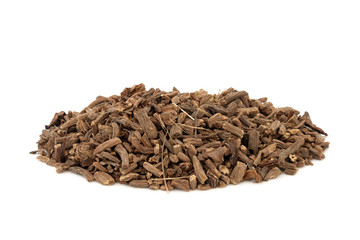 Valerian herb root used in herbal medicine as a tranquilizer & to treat insomnia, anxiety, hypertension, pain relief and is a muscle relaxant, on white background. Valeriana officinalis.
