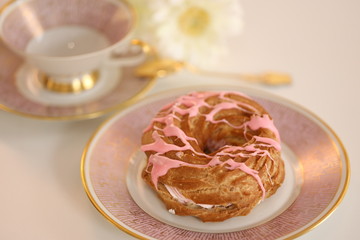Obraz na płótnie Canvas donut with icing sugar and cream