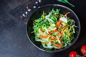 vegetables salad snack Peking savoy cabbage, onions, carrots, peppers and other vegetarian serving portion size natural product top view place for text copy space keto or paleo diet raw