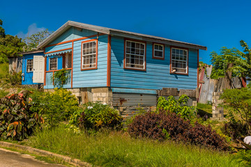 Fototapeta na wymiar A view towards typical Chattel houses on the Atlantic coast of Barbados