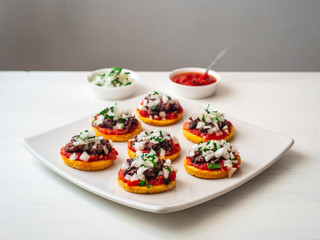 Sopes also known as Picadita, Traditional Mexican Dish Originating in the central and southern parts of Mexico That Looks like an Unusually Thick Tortilla with Toppings