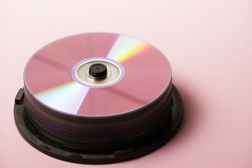 cd rooms or dvd tower on pink background flat lay