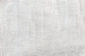 abstract background of white cheesecloth close up