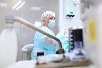 The work of doctors and dentists in the operating room. The device of artificial ventilation of lungs.Copy of the space.