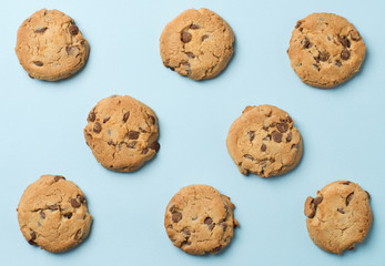 chocolate chip cookies blue background