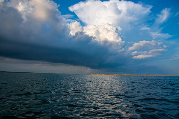 Obraz premium Boating at Sunset