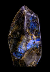 shining blue gemstone labradorite on a black background