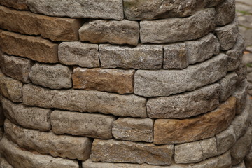 Gray stone wall made of natural stone