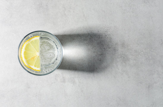 sparkling water with slice of lemon