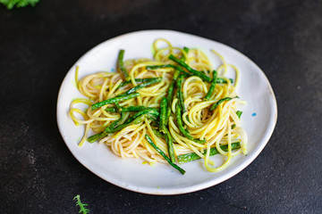 spaghetti green bean asparagus sauce cheese pasta second course vegetarian serving portion size natural product top view place for text copy space