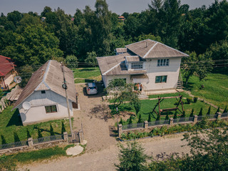 A house with trees in the background