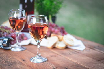 Glasses of Wine on Picnic Table