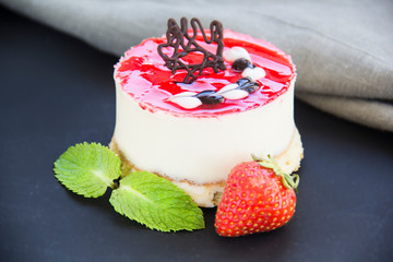 Italian dessert panna cotta with strawberries