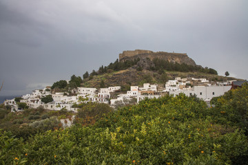 Obraz premium Lindos Acropolis and Lindos Village, Rhodes, Greece