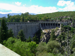 Fototapeta na wymiar Big dam in the mountains