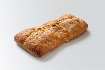 Italian ciabatta bread with olives, crispy, on a white background
