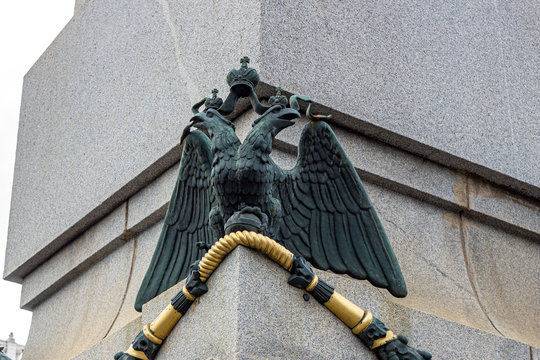 Double-headed Imperial eagle on a granite obelisk