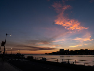 Fototapeta na wymiar Sunset at the Douro with silhouettes of the coast