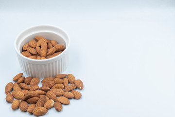 fresh almonds  in white cup 