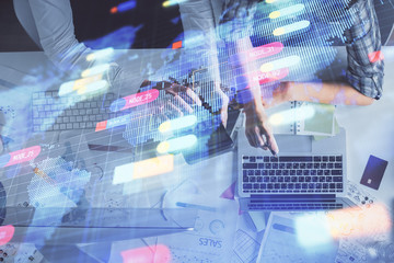 Double exposure of man and woman working together and data theme hologram drawing. Computer background. Top View.