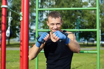 Obraz premium a boxer does training sessions in the morning on the sports field