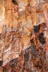 Sandstone rock in the Kimberley region of Western Australia as background.