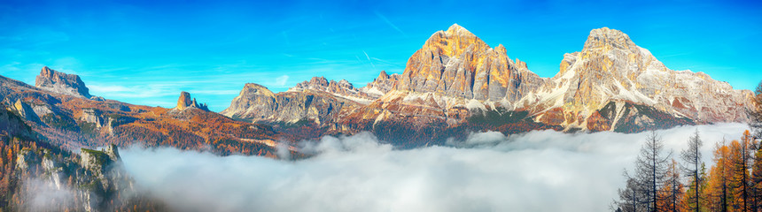 Astonishing autumn sunny landscape with View of Tofana di Rozes and Cinque Torri