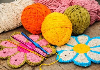 knitted flowers and yarn