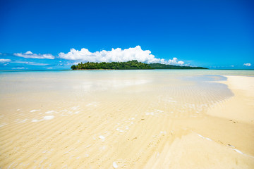 Blue ocean, clear water, long beach and sand way to  Ngerkeklau island, Ngarchelong state, Palau, Pacific