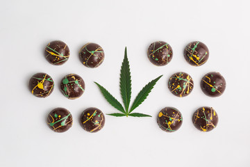 CBD chocolate infused with cannabis and cool coloured cocoa butter design.