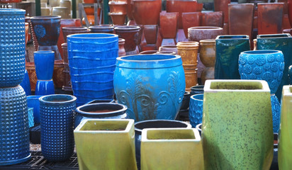 Many colorful plant pots up for sale 
